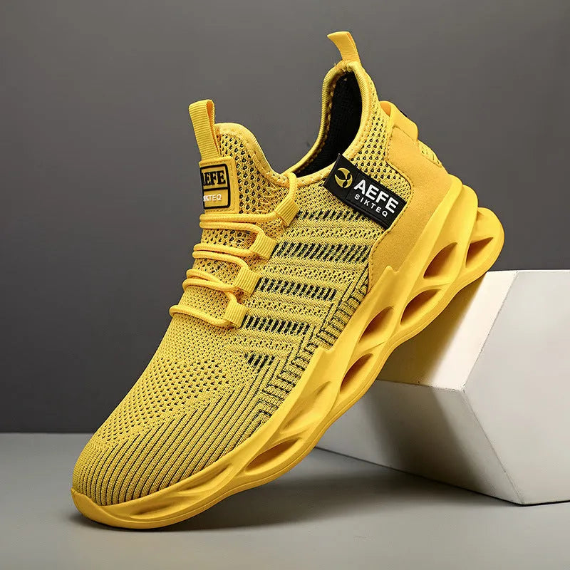 Men's black mesh casual running shoes with cross straps, low-top design, and rounded toe.
