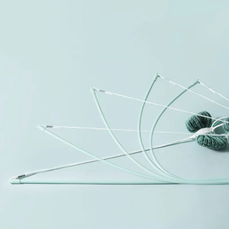 Long blue cat teaser wand with feathers and a pet rocket design on a white background.
