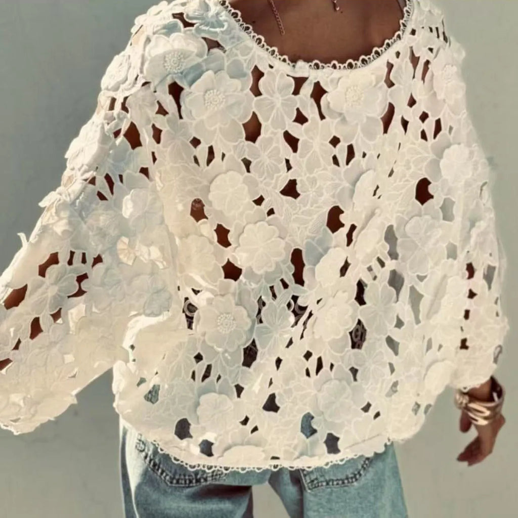 Loose fit black lace cardigan with V-neck, hollow long sleeves, and raised three-dimensional floral lace decoration.