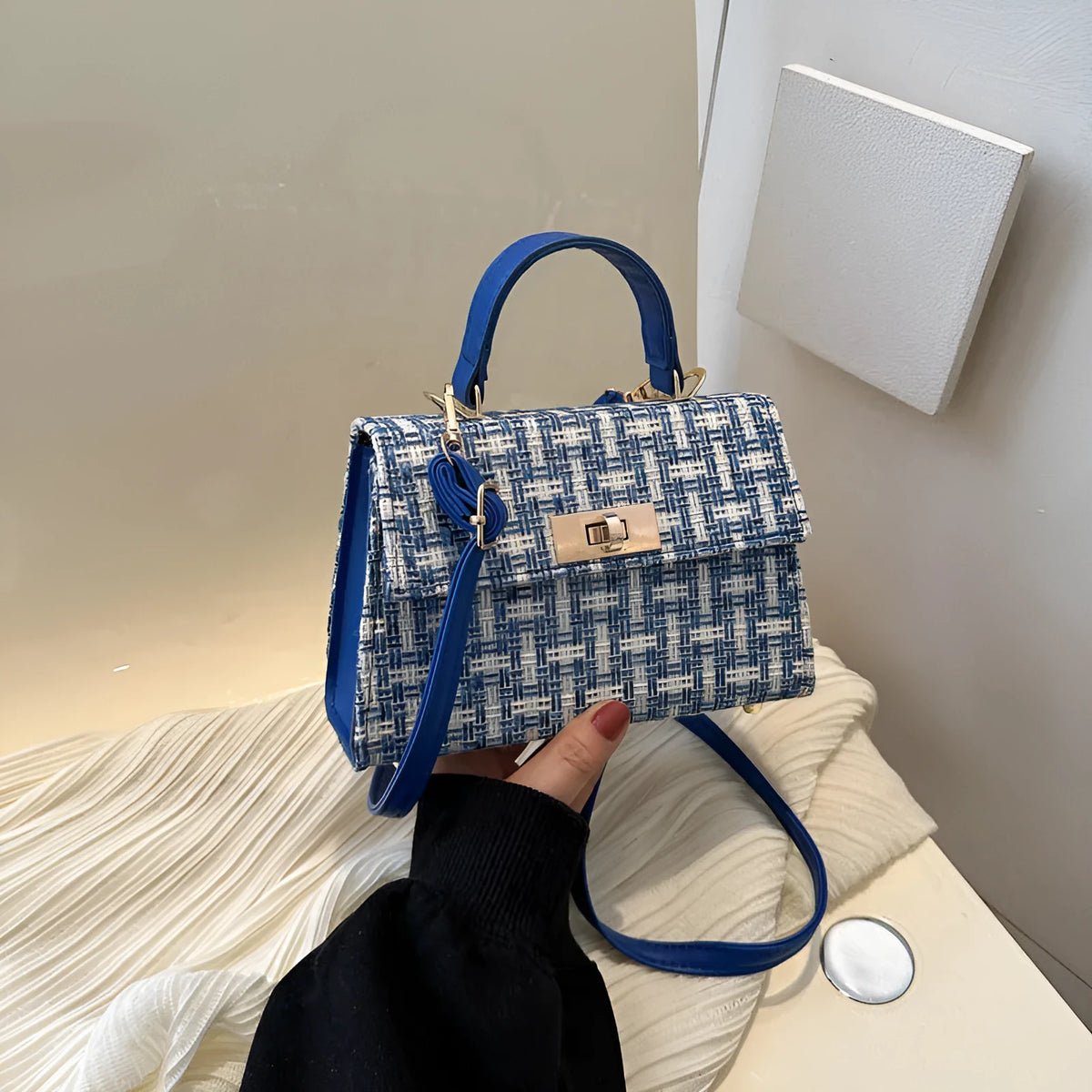 Casual PU crossbody shoulder bag with polyester lining, shown in black, white, blue and red colour options
