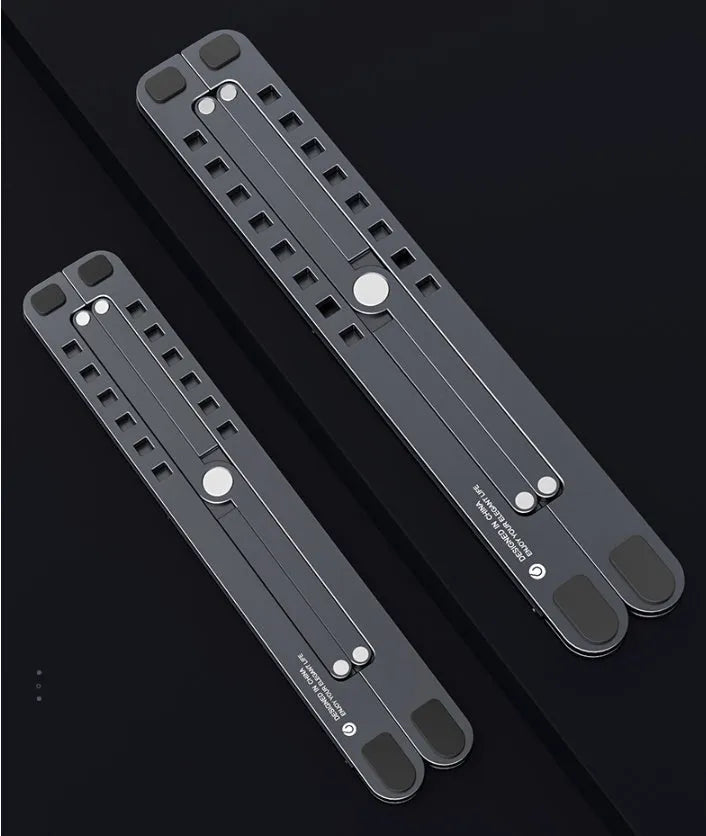 Aluminium foldable laptop stand in silver colour showing adjustable height and compact folded size.