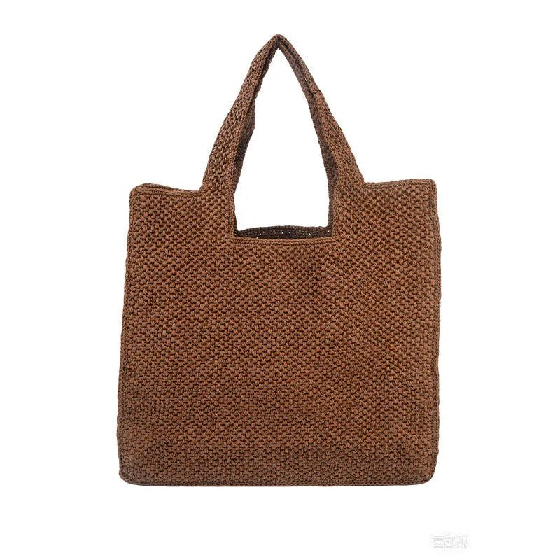 Horizontal square woven straw tote bag with open pockets and double shoulder straps