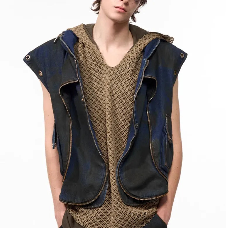 Blue hooded denim vest coat and matching trousers laid flat.