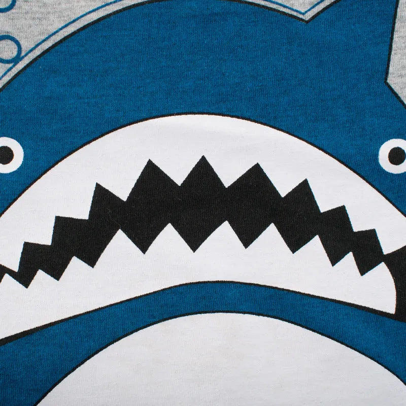 Grey cotton children's t-shirt shown with a size chart listing measurements from 90cm to 140cm.