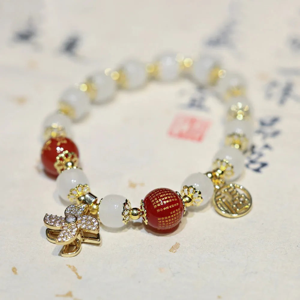 Women's Chinese style coloured glaze glass bracelet with safety lock, windmill, and bamboo charms
