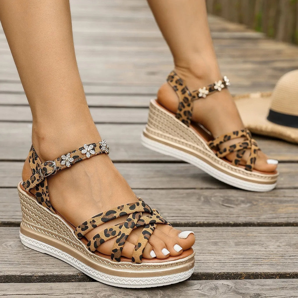 Light brown suede women's platform sandals with a buckle ankle strap.