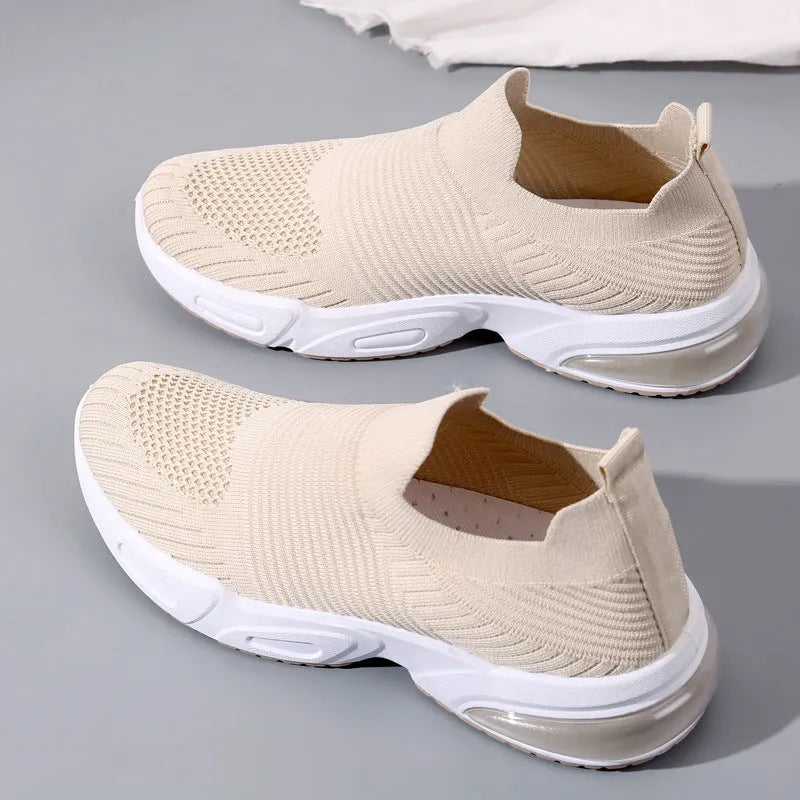 Slip-on sock shoes with mesh lining and lightweight PVC sole in black, white, khaki and pink colours