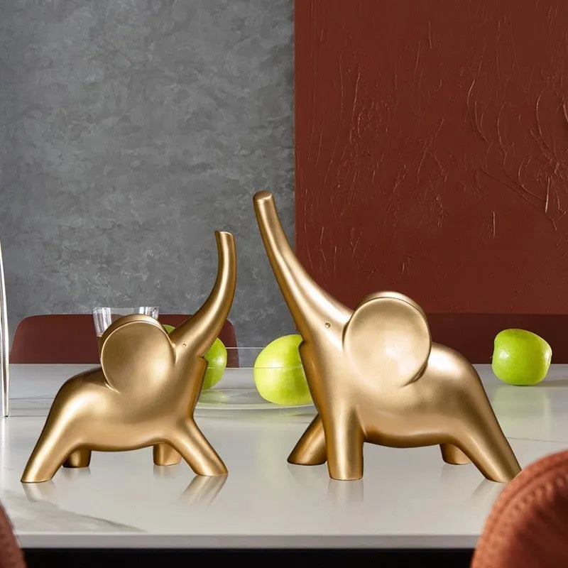 Modern simple style resin elephant ornament in rose gold or white, available in large and small sizes.