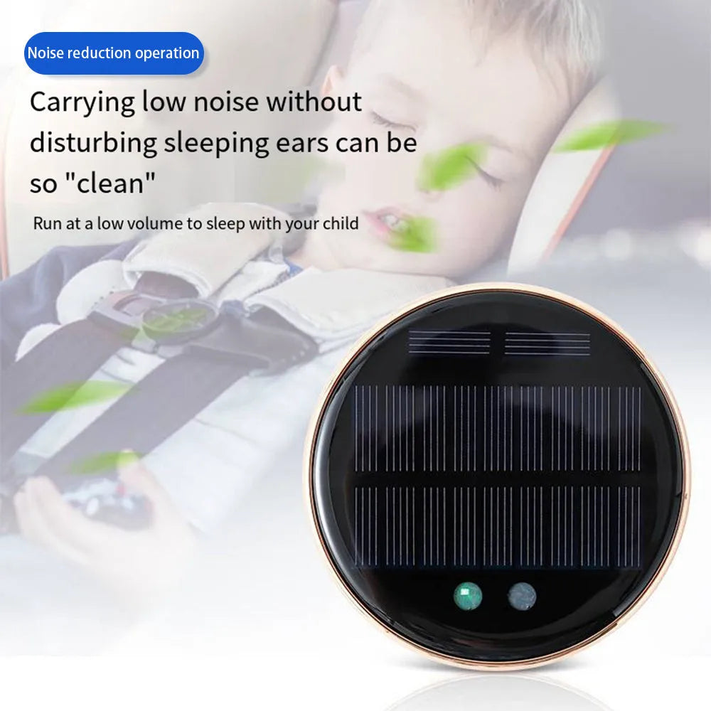 Black solar car humidifier mounted on vehicle air conditioning outlet with moisture mist visible