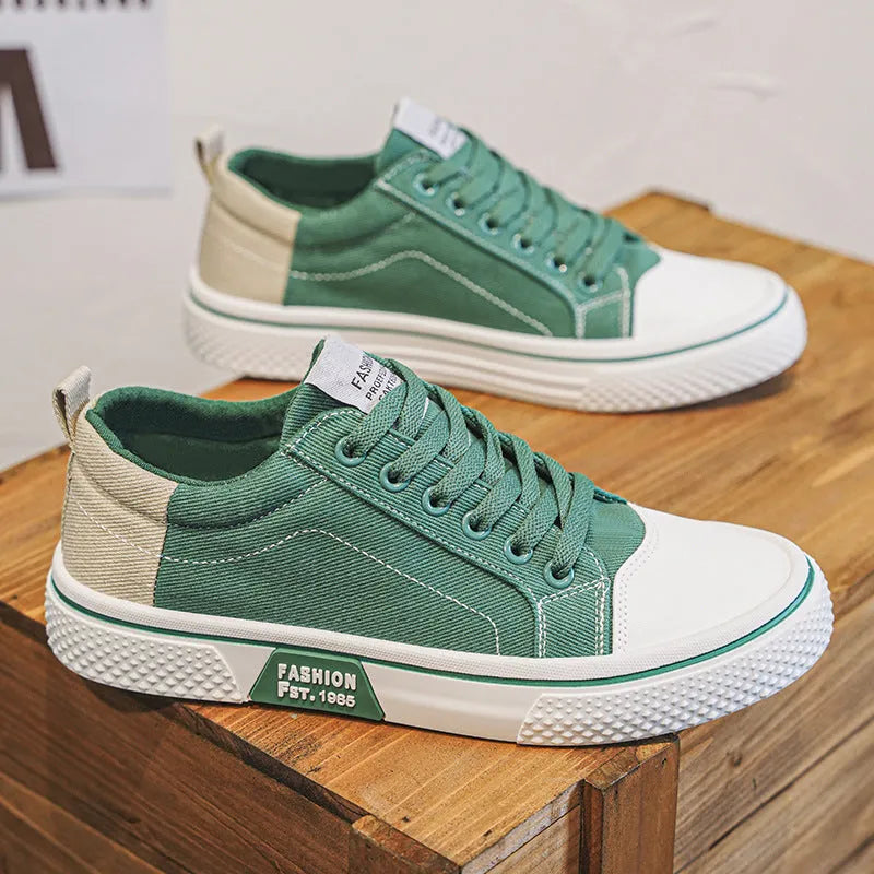Men's low-top casual canvas shoes in blue colour with round toe and front lace-up design