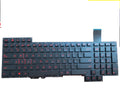 Black wired notebook keyboard with PS/2 cable, multimedia keys, and compact design on a desk.