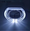 Angel eye LED halo light ring with integrated polymer plastic cover, shown in blue light, for vehicle headlight upgrade.