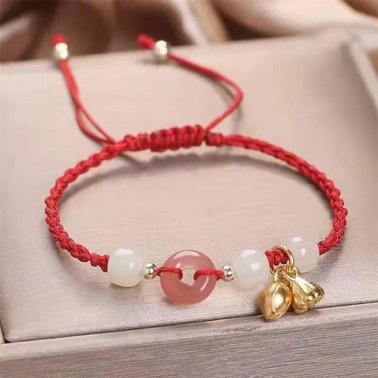 Hetian Jade Peace Buckle Two Shihuan Bracelet with brown leather strap showing constellation detail.