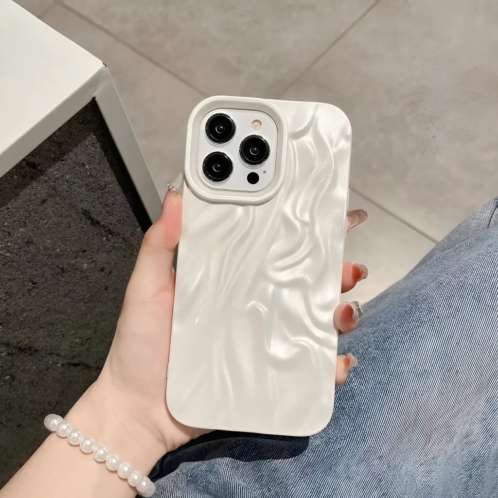 High-grade silicone iPhone case with a water ripple texture in beige white colour on a table.