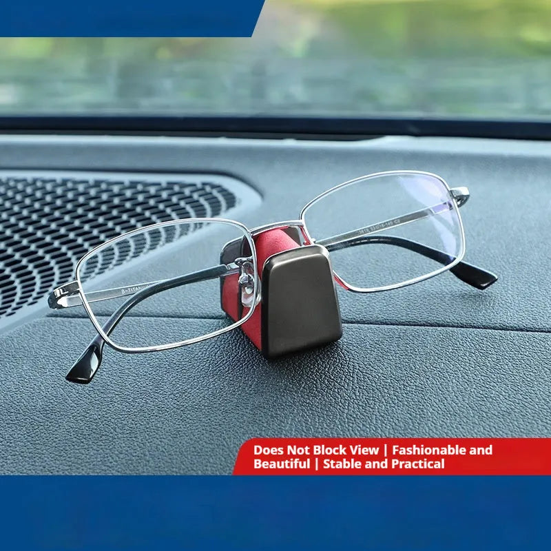 Zinc alloy and leather car dashboard clip for holding sunglasses, shown in green, black, grey, or red.