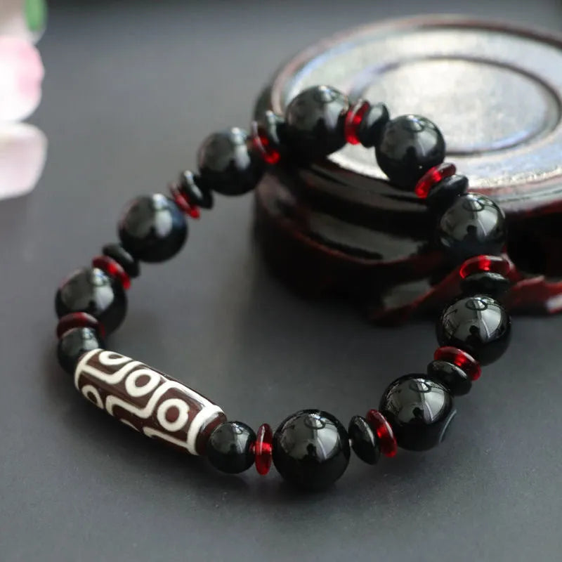 Hand-woven black agate and chalcedony dzi bead bracelet with 11mm geometry beads