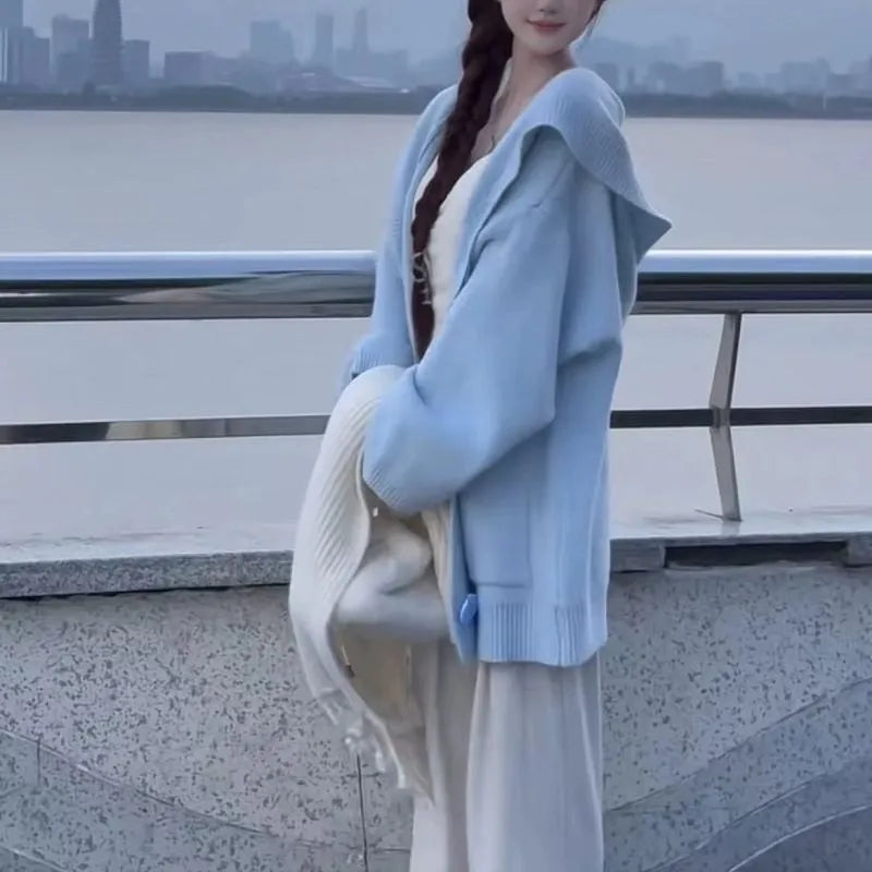 Sleeveless Ice Silk knitted cardigan with princess sleeves and button front, shown in available colours and sizes S to 2XL.