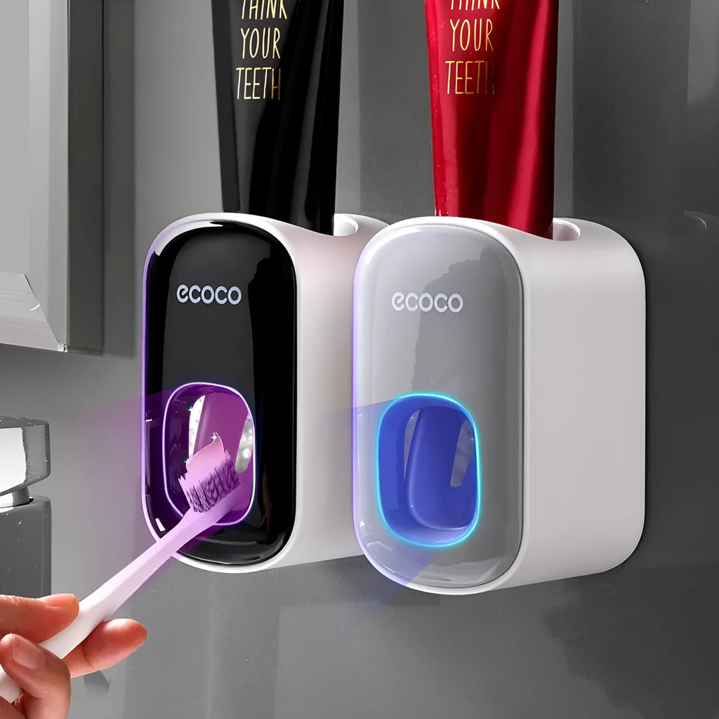 Black wall-mounted automatic toothpaste holder with toothbrush storage and suction cup mounting