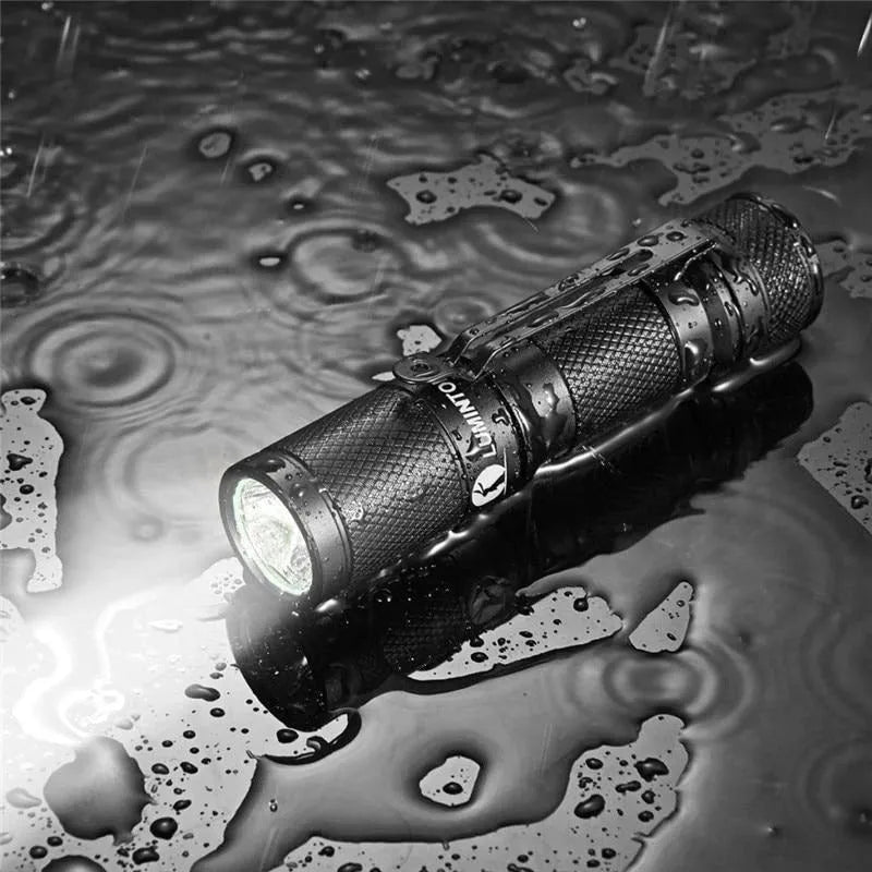 Lumintop Tool AA 2.0 black compact flashlight with magnetic tail cap and diffuser accessory