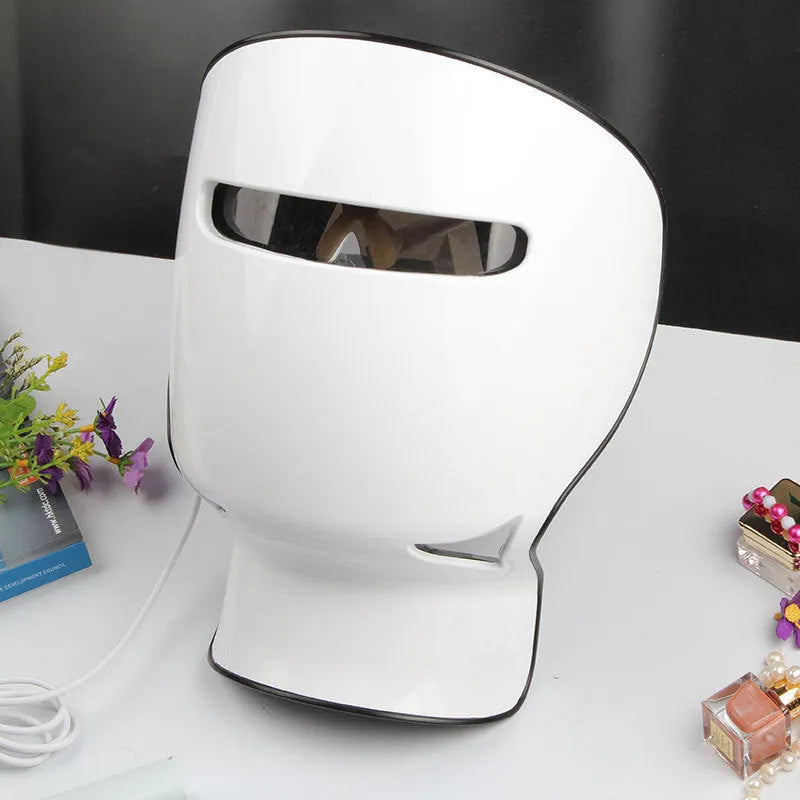 Inverse Age Phototherapy LED facial beauty instrument in white with face and neck mask, controller and power adapter