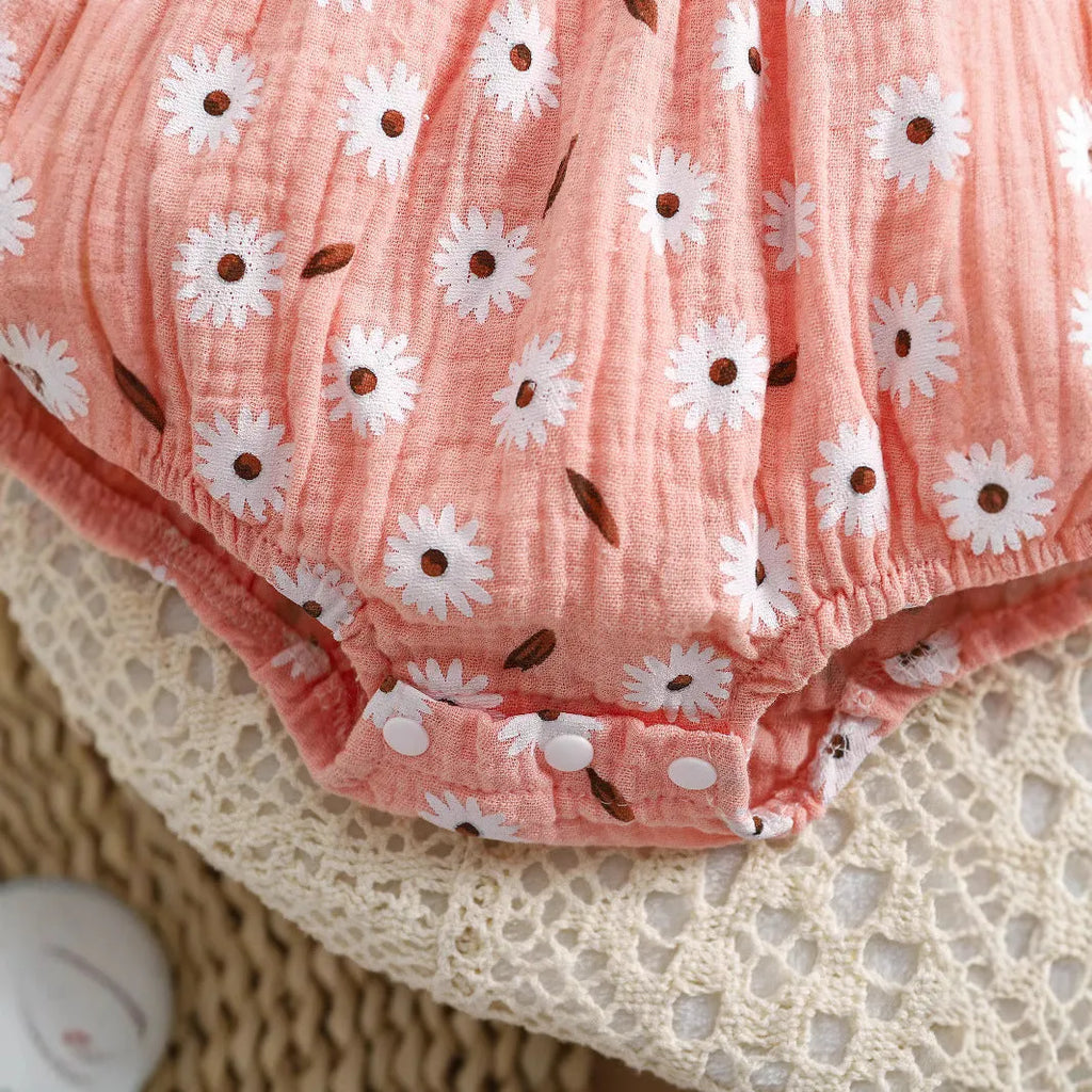 Pink cotton baby girl short-sleeved triangle jumpsuit with bow flower print and matching headband