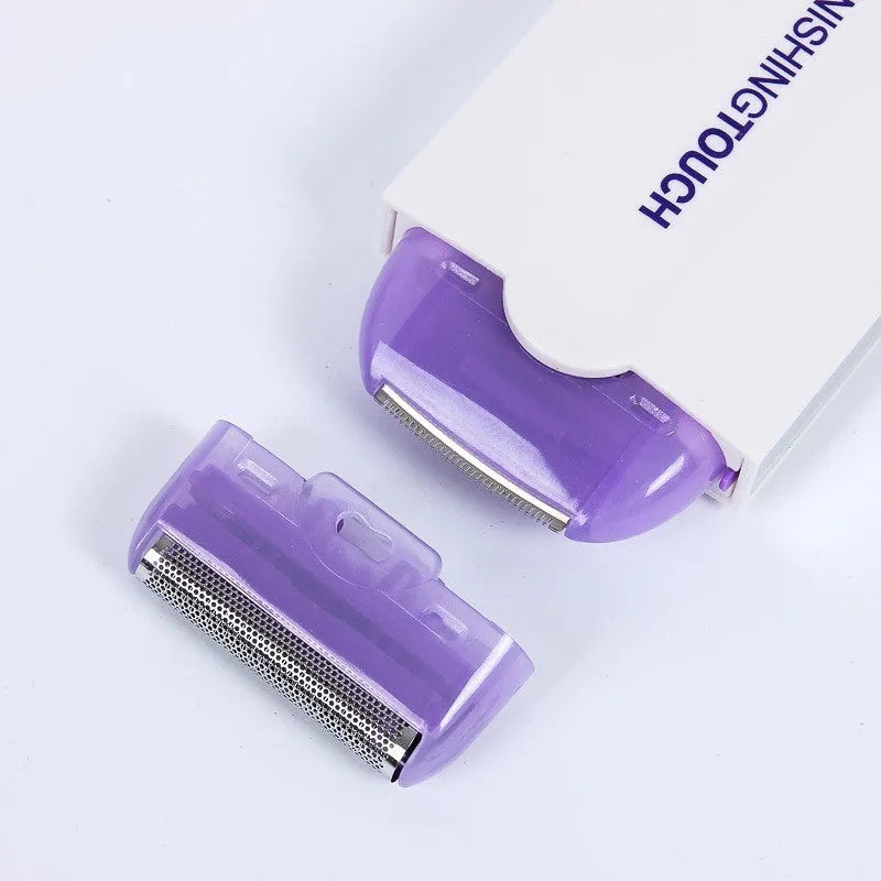 White electric hair removal shaver with foil head and trimmer head attachment on a blue background.