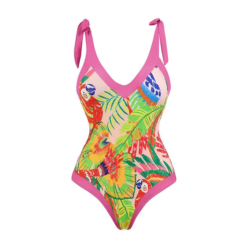 Retro pink floral print one-piece swimsuit with V-neck, thin skirt, and covered belly design.