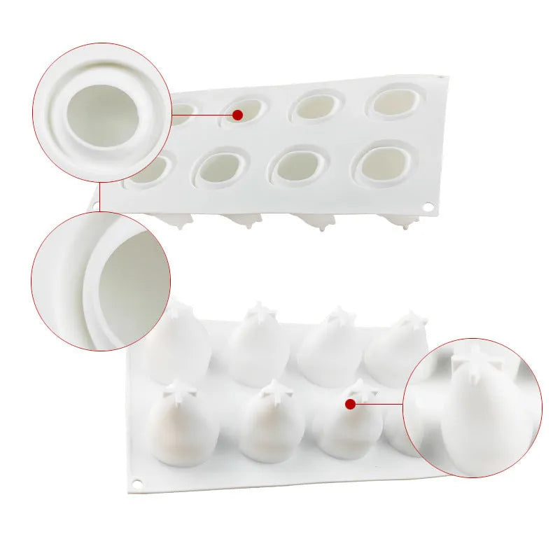Flexible silicone baking mould with six cavities shaped like pine cones, pineapples, and pears.