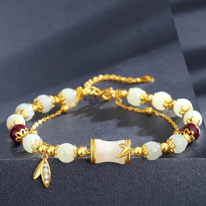 Bamboo-themed bracelet with ruyi motif and coloured flower glass beads on an electroplated chain.