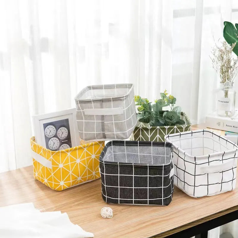 Foldable Oxford cloth desktop storage basket, 20x14x16cm, shown in a patterned pastoral style.