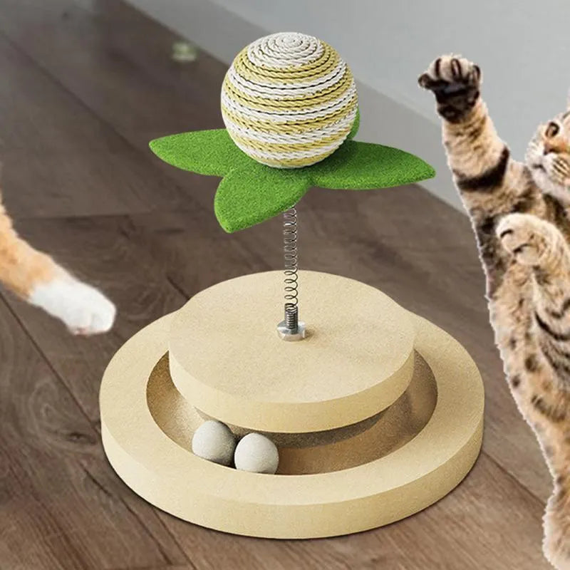Green sisal cat toy with rotating ball track system for indoor feline play
