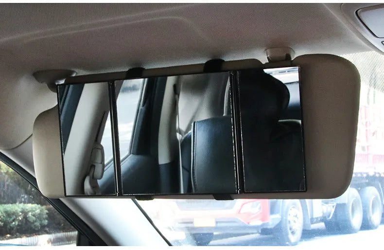 Silver car folding makeup mirror shown open and closed with dimensions