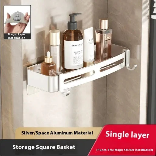 Gun grey wall-mounted corner bathroom storage rack with a single shelf, shown in a shower.