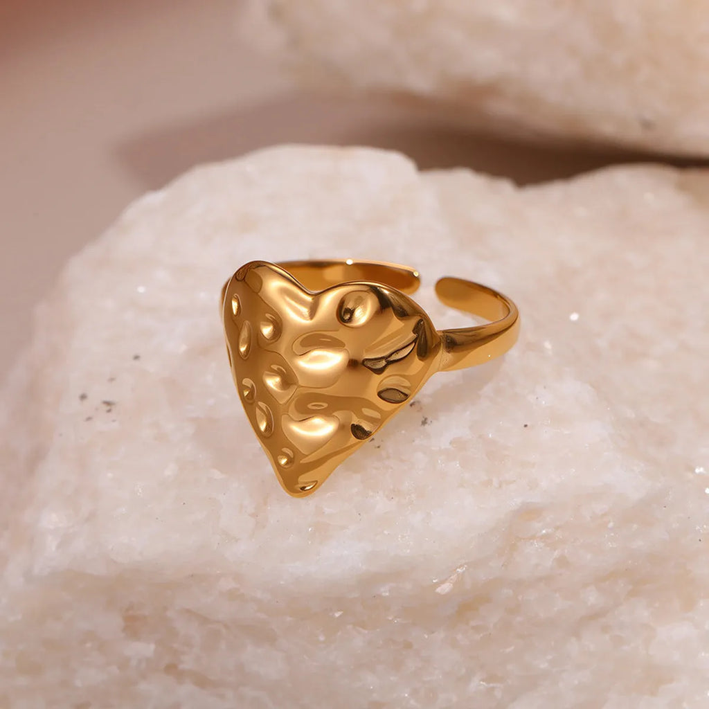 Heart-shaped stainless steel open ring for women with electroplated finish and geometric star design, average size.