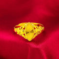 Gold coloured brass ring with open diamond flower design and geometric textured shape