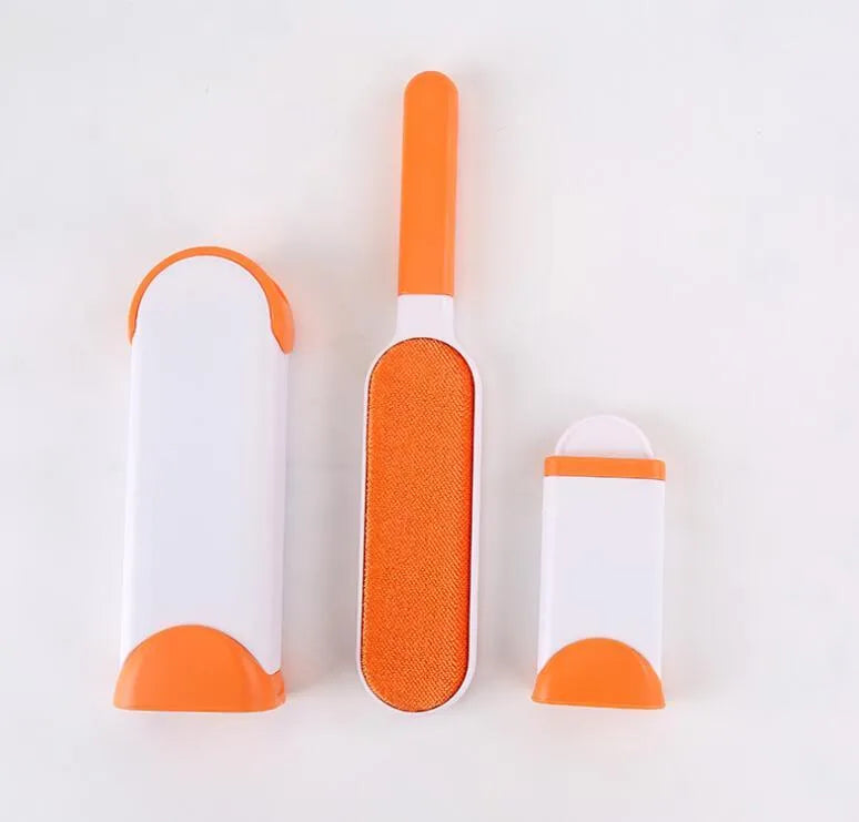 Blue self-cleaning pet hair remover brush with double-sided roller next to its cleaning base.