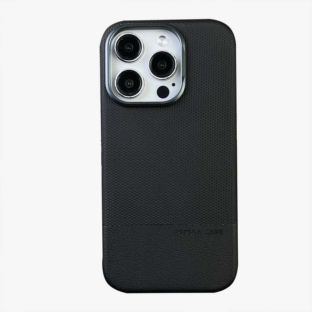 Black iPhone case with dragon scale texture and leather stitching, showing built-in magnetic ring on the back.