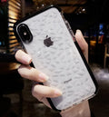 TPU iPhone case with striped back design in three colour options: black, pink with white edge, white with black border
