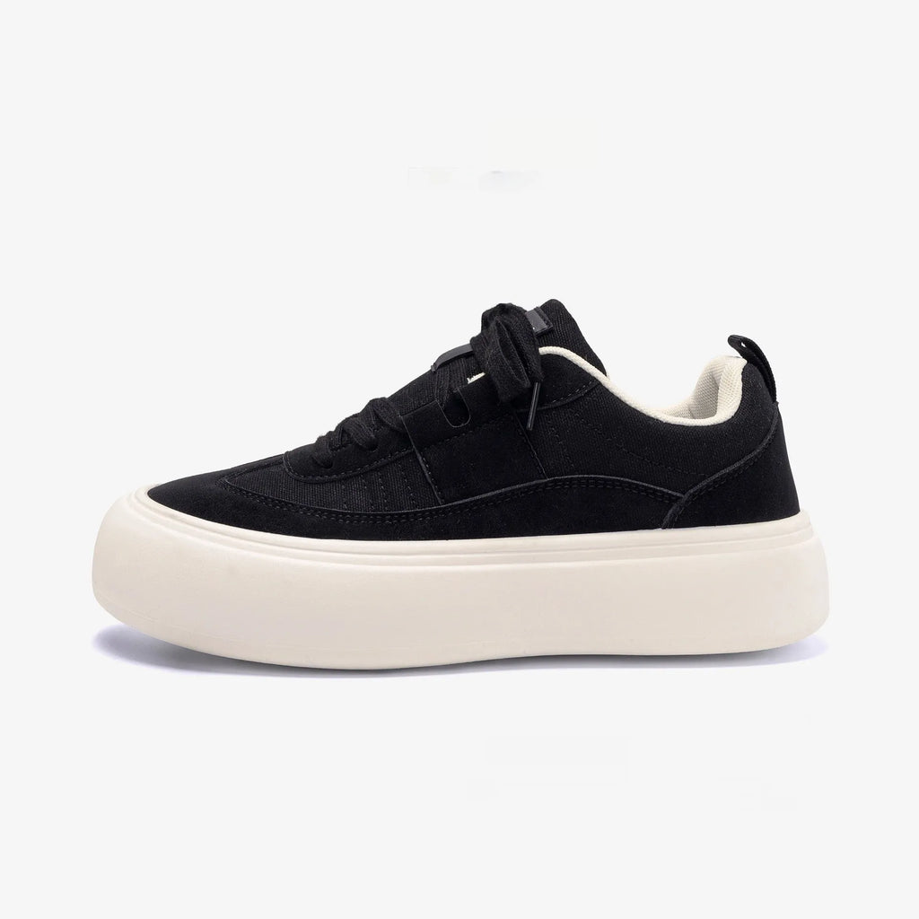 Men's black canvas platform lace-up shoes with a round toe and low-top design on a white background.