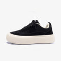 Men's black canvas platform lace-up shoes with a round toe and low-top design on a white background.