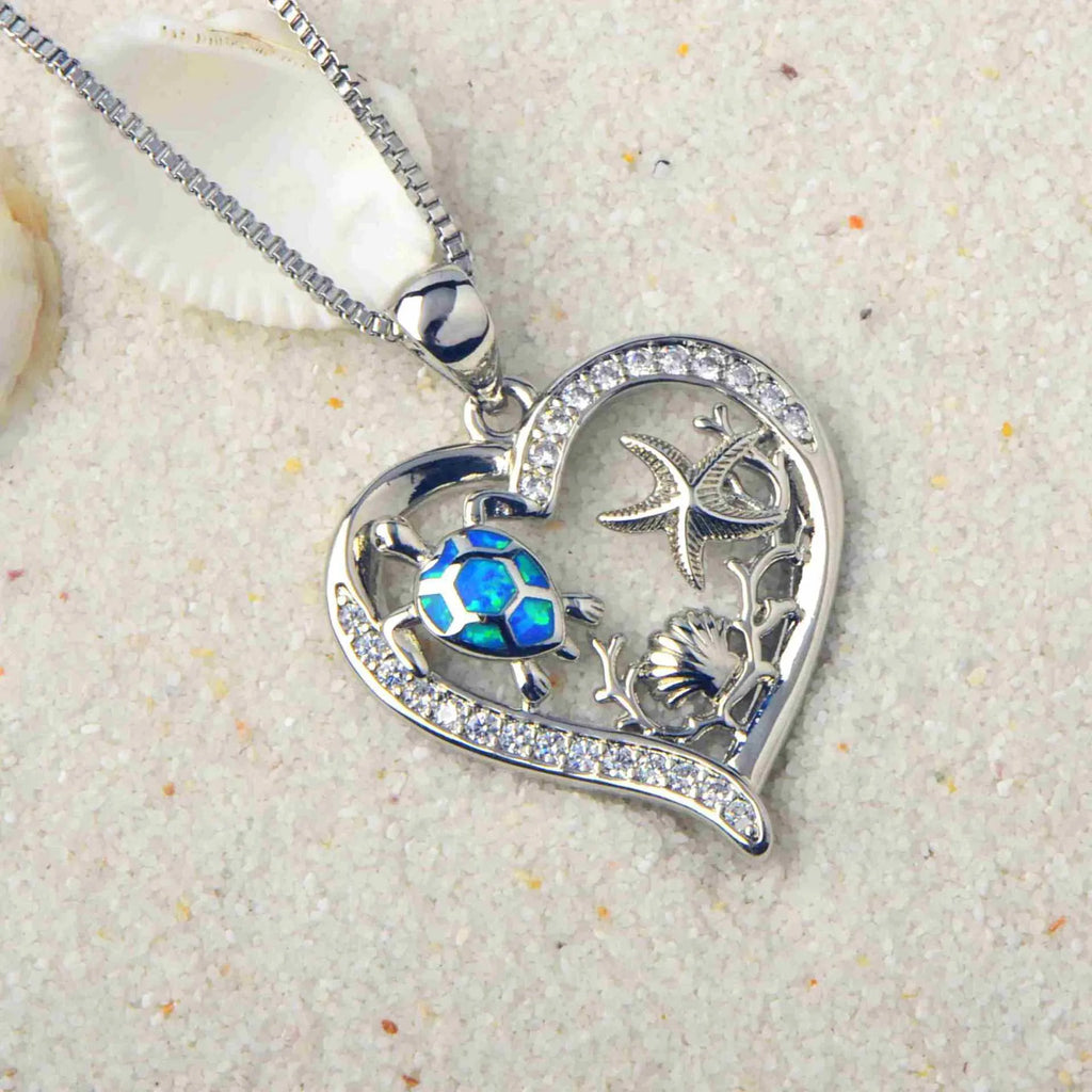 Blue synthetic opal turtle love pendant on copper electroplated base