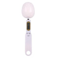 White digital spoon kitchen scale with LCD display showing weight measurement