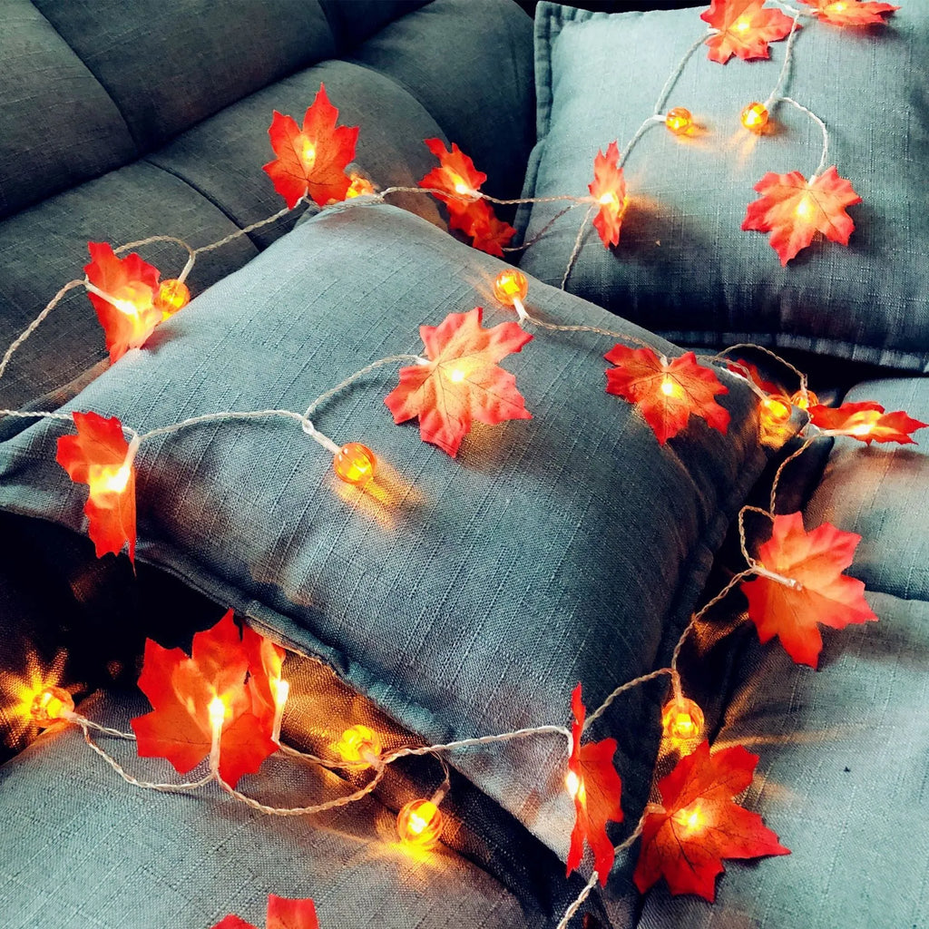 Halloween LED string lights with pumpkin and maple leaf designs, 1.5m 10-light warm white battery-operated decoration