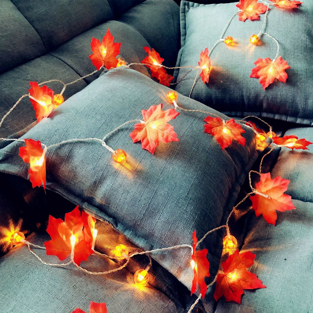 Halloween LED string lights with pumpkin and maple leaf designs, 1.5m 10-light warm white battery-operated decoration