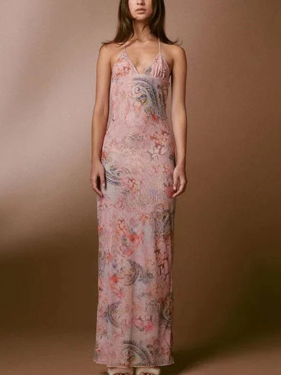 Floral print halter dress with spaghetti straps, slim silhouette, and butterfly back design, available in various colors