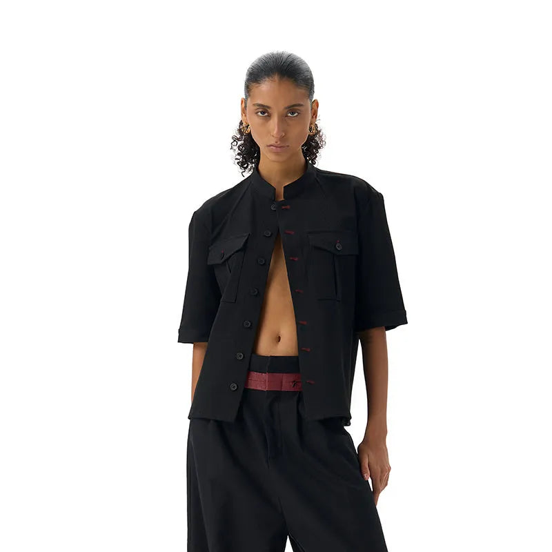 Handmade black loose fit half sleeve men's shirt with a shirt collar.