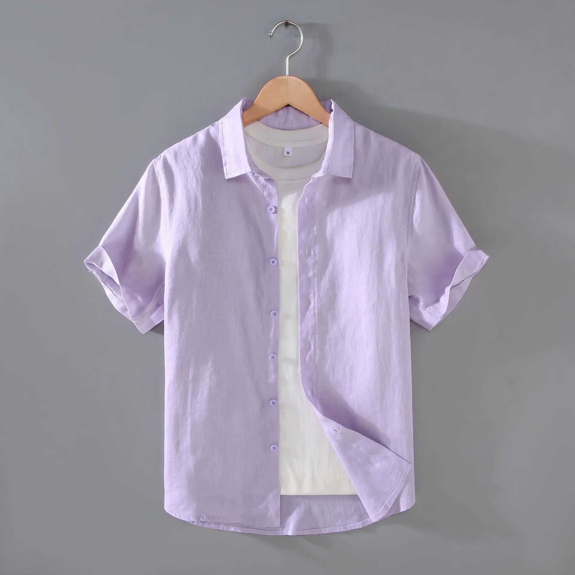 Men's casual short-sleeved linen shirt in regular fit showing colour options including apricot, dark blue, and gray
