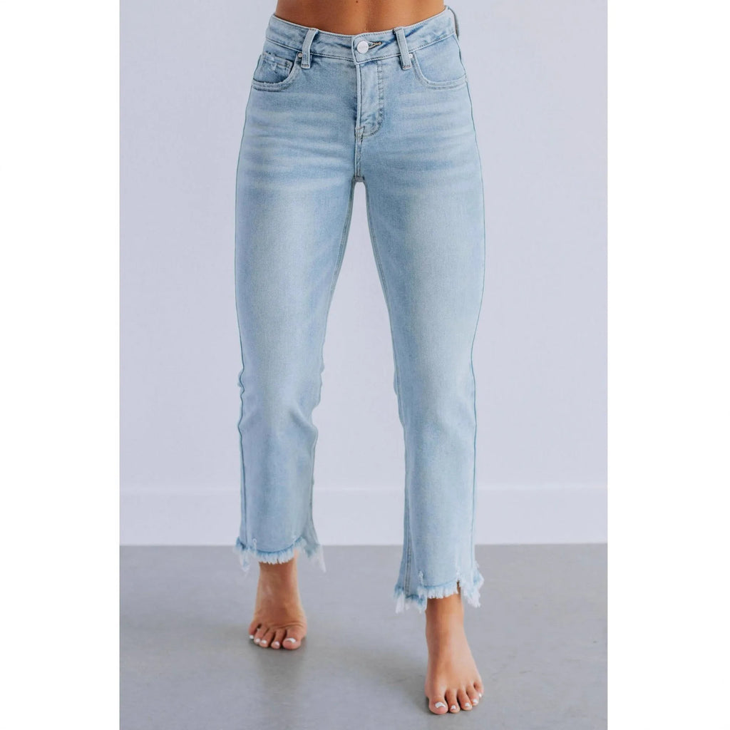 Women's solid colour denim trousers with hand-distressed detailing in dark blue