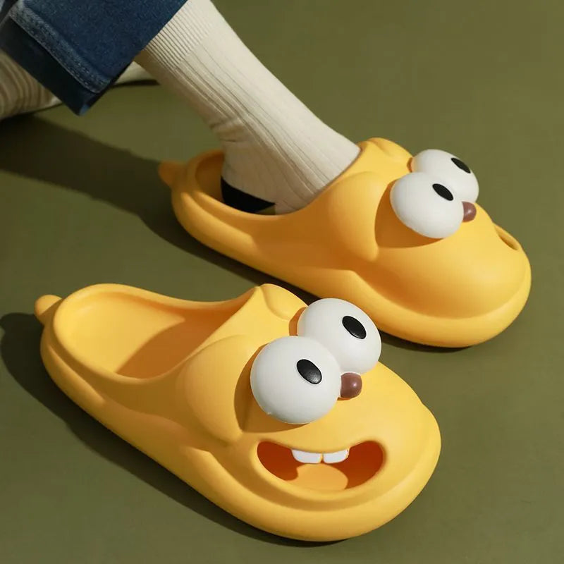 Pair of cartoon big eye dog PVC slippers for women in green colour