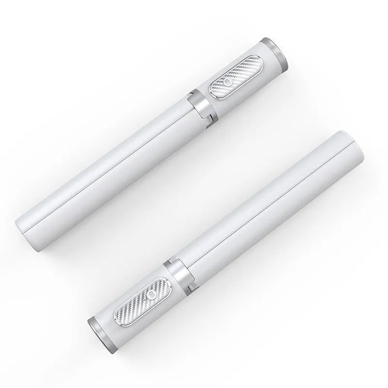 Black gold aluminum alloy Bluetooth selfie stick tripod extended to 1.7m holding a smartphone